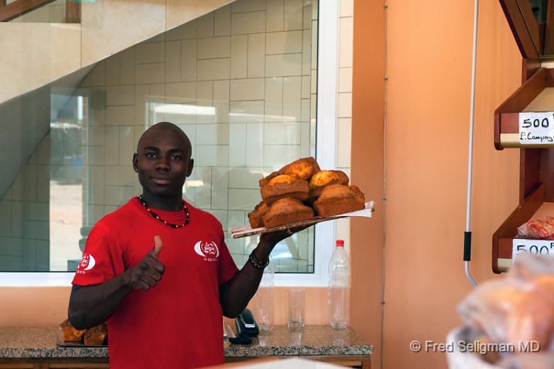 20090529_111439 D3 P1 P1.jpg - This man was really proud of his cakes and wanted to make sure I had a photo of them